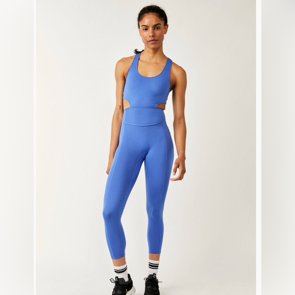 New with tags , free people movement one piece onesie. Size small.